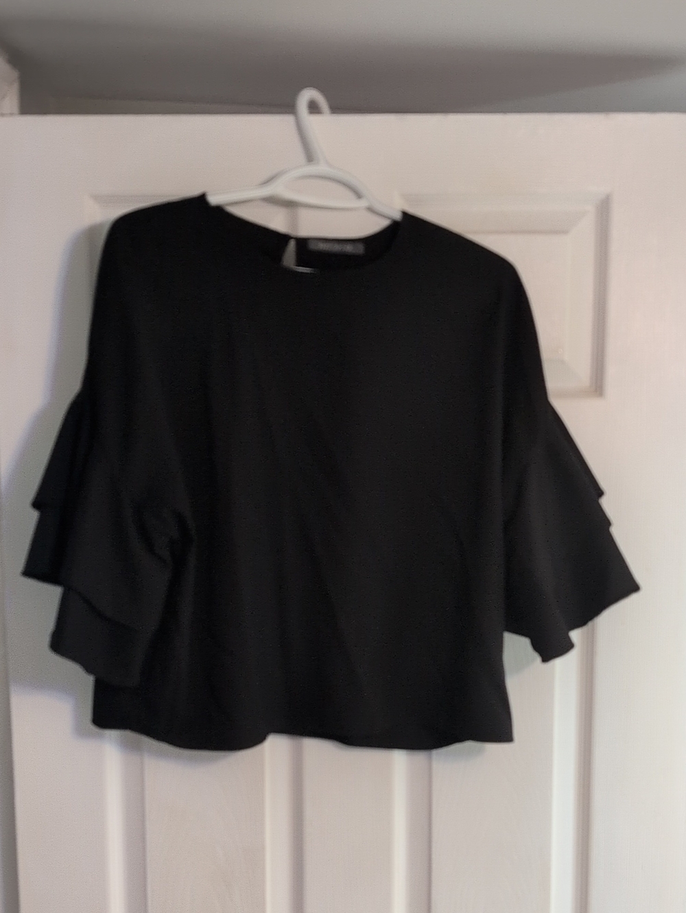 Suzy Shier Black Ruffle Sleeve Blouse